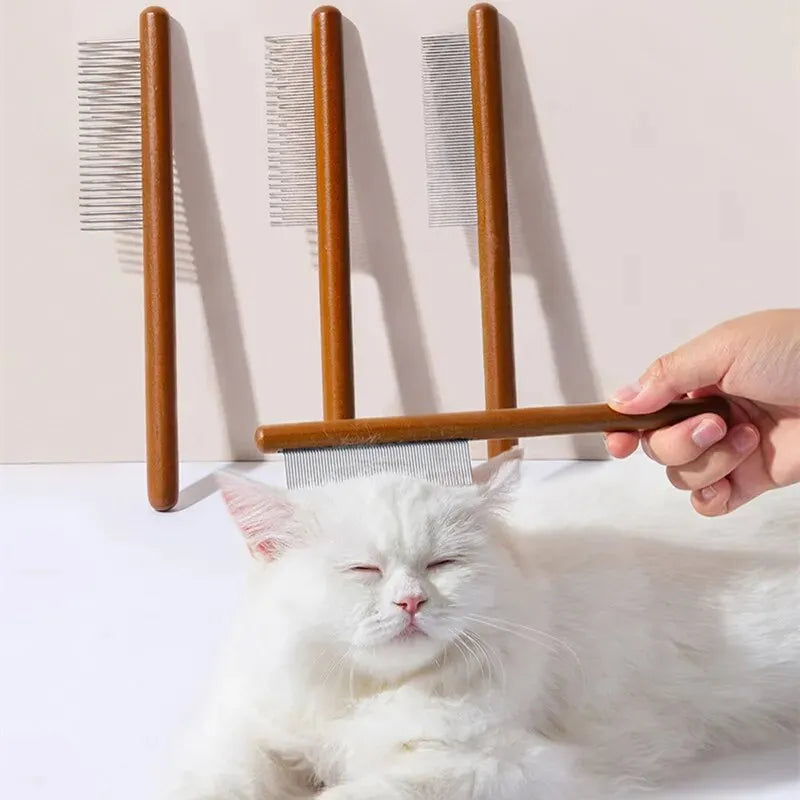 Kattkam med långt trähandtag och fina metalltänder